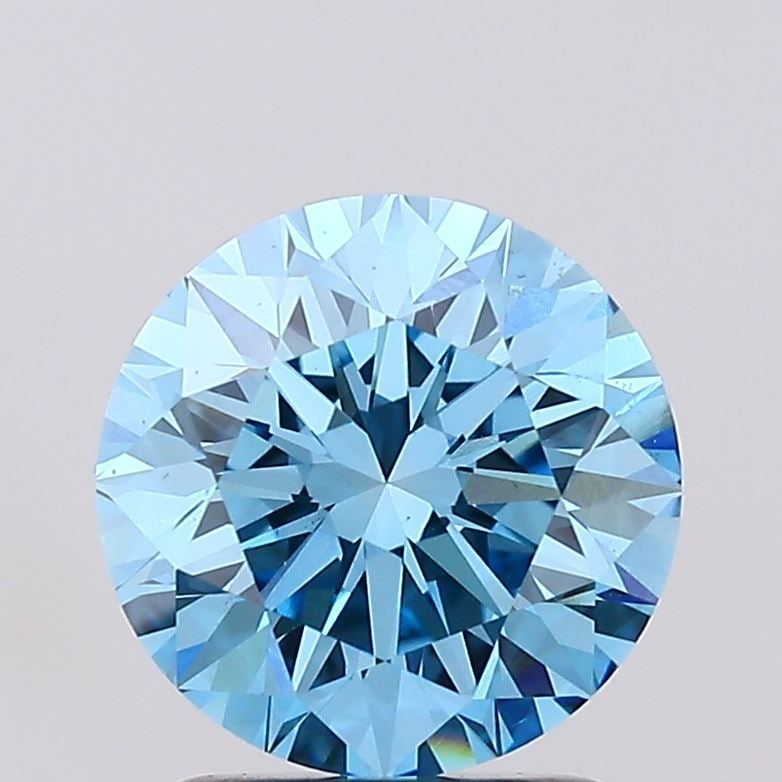 Loose Diamond - ROUND 1.8ct Fancy Vivid Blue VS1: Loose Diamond - ROUND 1.8ct Fancy Vivid Blue VS1 Source: This is a real non-mined Diamond that has been grown in a lab Shape: ROUND Carats: 1.8 Color: Fancy Vivid Blue Certification: IGI Video: