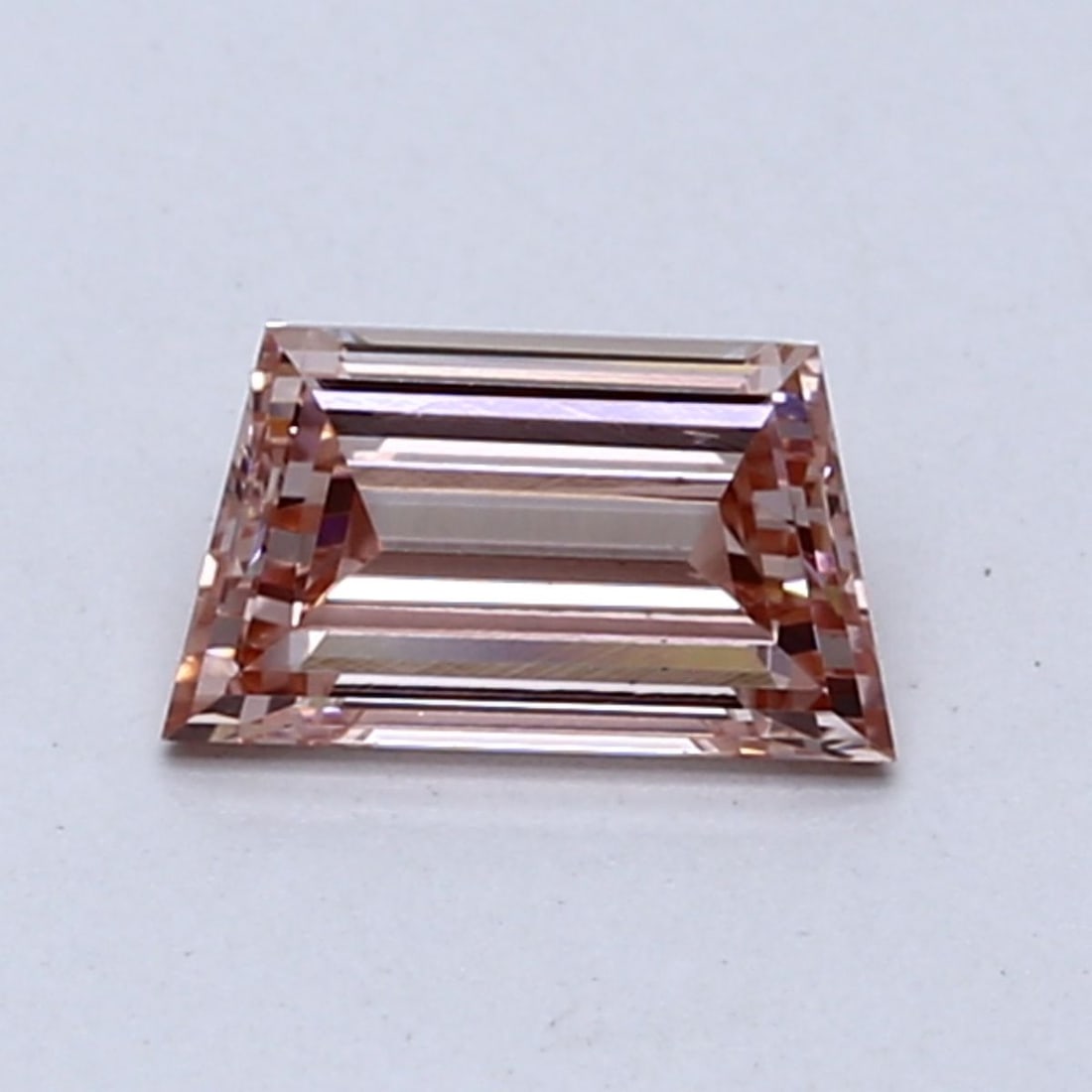 Loose Diamond - TRAPEZOID 0.65ct Fancy Intense Pink VS2: Loose Diamond - TRAPEZOID 0.65ct Fancy Intense Pink VS2 Source: This is a real non-mined Diamond that has been grown in a lab Shape: TRAPEZOID Carats: 0.65 Color: Fancy Intense Pink Certification: NON
