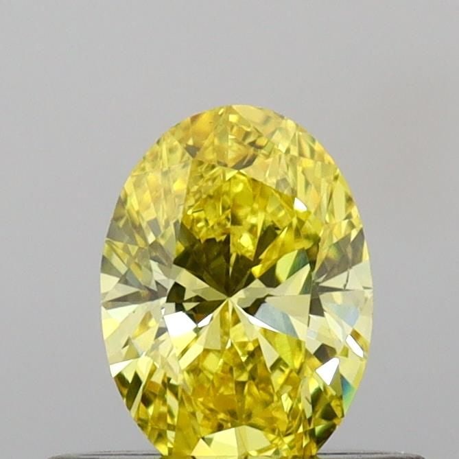 Loose Diamond - OVAL 0.44ct Fancy Vivid Yellow VS2: Loose Diamond - OVAL 0.44ct Fancy Vivid Yellow VS2 Source: This is a real non-mined Diamond that has been grown in a lab Shape: OVAL Carats: 0.44 Color: Fancy Vivid Yellow Certification: IGI Video: