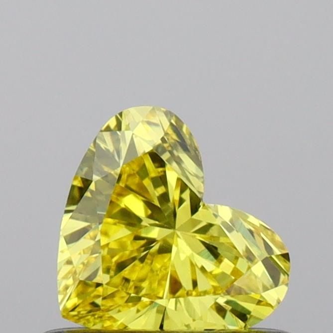 Loose Diamond - HEART 0.44ct Fancy Vivid Yellow VVS2: Loose Diamond - HEART 0.44ct Fancy Vivid Yellow VVS2 Source: This is a real non-mined Diamond that has been grown in a lab Shape: HEART Carats: 0.44 Color: Fancy Vivid Yellow Certification: IGI Video: