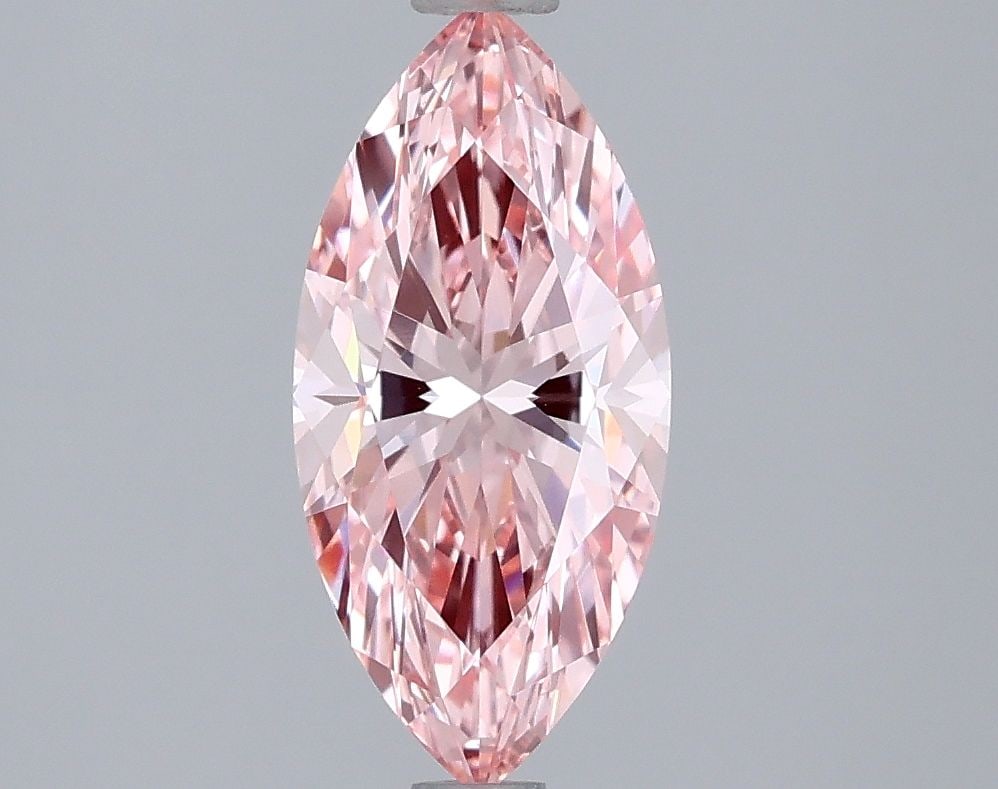 Loose Diamond - MARQUISE 1.39ct Fancy Vivid Pink VVS2: Loose Diamond - MARQUISE 1.39ct Fancy Vivid Pink VVS2 Source: This is a real non-mined Diamond that has been grown in a lab Shape: MARQUISE Carats: 1.39 Color: Fancy Vivid Pink Certification: IGI Vide