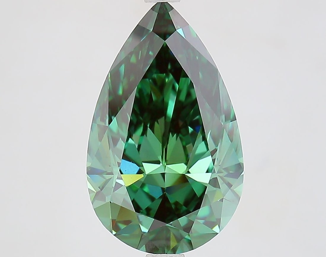 Loose Diamond - PEAR 4.23ct Fancy Vivid Green VVS2: Loose Diamond - PEAR 4.23ct Fancy Vivid Green VVS2 Source: This is a real non-mined Diamond that has been grown in a lab Shape: PEAR Carats: 4.23 Color: Fancy Vivid Green Certification: IGI Video: