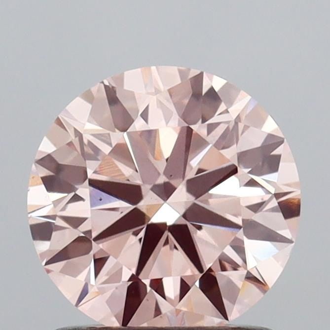 Ideal Loose Diamond - ROUND 1.11ct Fancy Pink VS2: Ideal Loose Diamond - ROUND 1.11ct Fancy Pink VS2 Source: This is a real non-mined Diamond that has been grown in a lab Shape: ROUND Carats: 1.11 Color: Fancy Pink Certification: IGI Video: