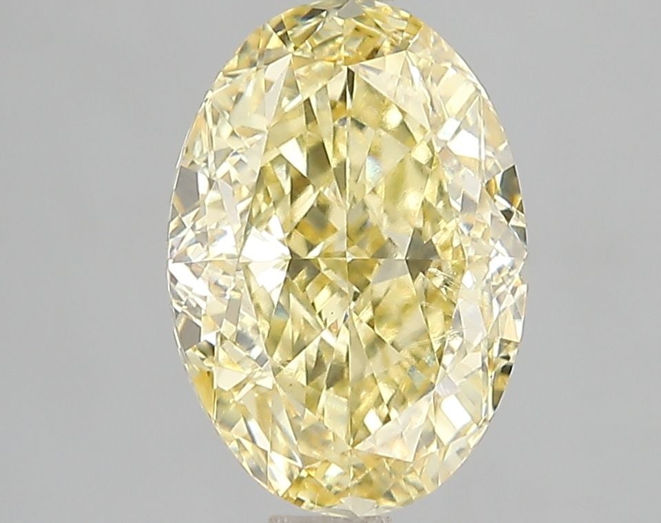 Loose Diamond - OVAL 3.03ct Fancy Vivid Yellow VS1: Loose Diamond - OVAL 3.03ct Fancy Vivid Yellow VS1 Source: This is a real non-mined Diamond that has been grown in a lab Shape: OVAL Carats: 3.03 Color: Fancy Vivid Yellow Certification: IGI Video: