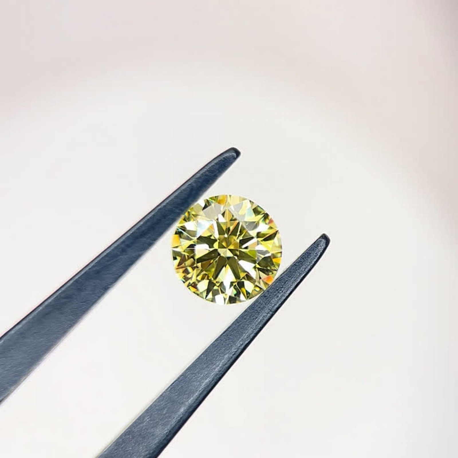 Ideal Loose Diamond - ROUND 1.26ct Fancy Intense Yellow VVS2: Ideal Loose Diamond - ROUND 1.26ct Fancy Intense Yellow VVS2 Source: This is a real non-mined Diamond that has been grown in a lab Shape: ROUND Carats: 1.26 Color: Fancy Intense Yellow Certification: 