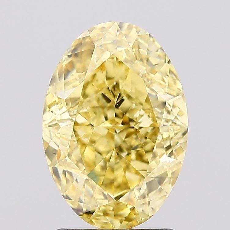Loose Diamond - OVAL 2.32ct Fancy Vivid Yellow VS2: Loose Diamond - OVAL 2.32ct Fancy Vivid Yellow VS2 Source: This is a real non-mined Diamond that has been grown in a lab Shape: OVAL Carats: 2.32 Color: Fancy Vivid Yellow Certification: IGI Video: