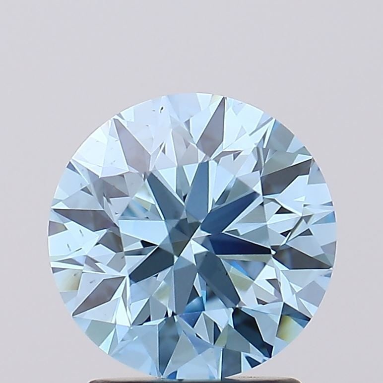 Loose Diamond - ROUND 2.01ct Fancy Vivid Blue VS1: Loose Diamond - ROUND 2.01ct Fancy Vivid Blue VS1 Source: This is a real non-mined Diamond that has been grown in a lab Shape: ROUND Carats: 2.01 Color: Fancy Vivid Blue Certification: IGI Video: