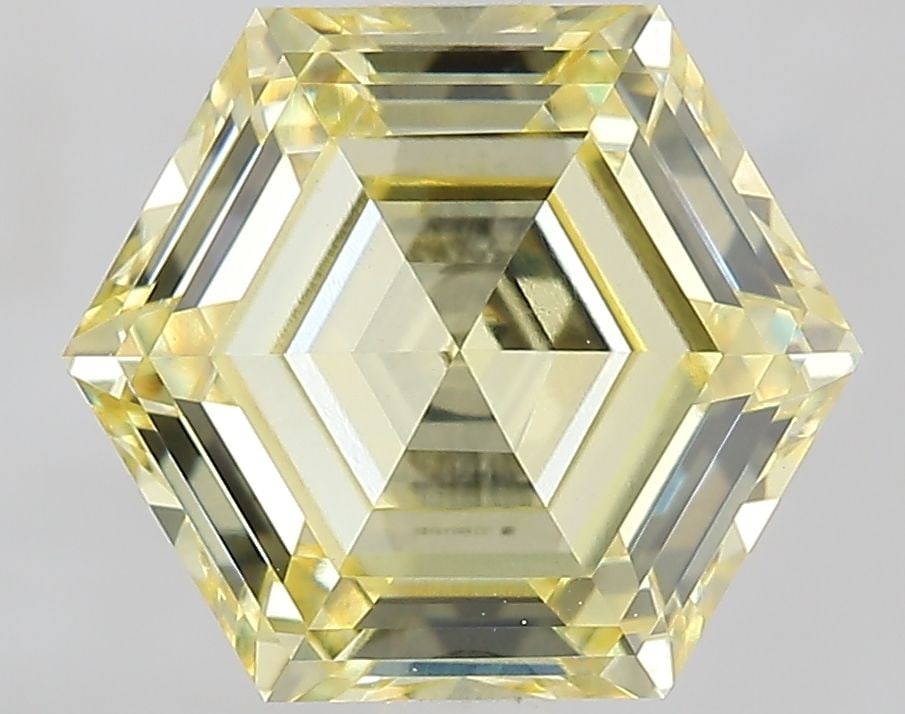 Loose Diamond - HEXAGONAL 2.52ct Fancy Yellow VVS2: Loose Diamond - HEXAGONAL 2.52ct Fancy Yellow VVS2 Source: This is a real non-mined Diamond that has been grown in a lab Shape: HEXAGONAL Carats: 2.52 Color: Fancy Yellow Certification: IGI Video: