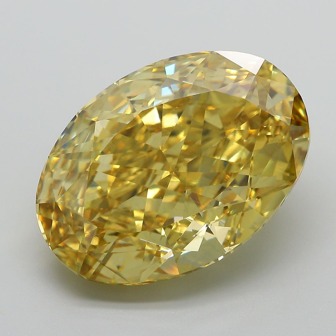 Loose Diamond - OVAL 19.13ct Fancy Vivid Yellow VS1: Loose Diamond - OVAL 19.13ct Fancy Vivid Yellow VS1 Source: This is a real non-mined Diamond that has been grown in a lab Shape: OVAL Carats: 19.13 Color: Fancy Vivid Yellow Certification: IGI Video: