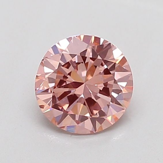 Loose Diamond - ROUND 0.71ct Fancy Vivid Pink VS2: Loose Diamond - ROUND 0.71ct Fancy Vivid Pink VS2 Source: This is a real non-mined Diamond that has been grown in a lab Shape: ROUND Carats: 0.71 Color: Fancy Vivid Pink Certification: NONE The Diamon