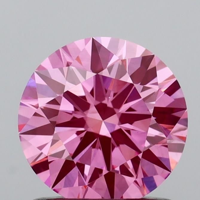 Ideal Loose Diamond - ROUND 1.01ct Fancy Vivid Pink VS2: Ideal Loose Diamond - ROUND 1.01ct Fancy Vivid Pink VS2 Source: This is a real non-mined Diamond that has been grown in a lab Shape: ROUND Carats: 1.01 Color: Fancy Vivid Pink Certification: IGI Video