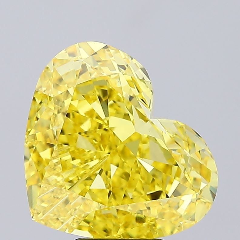 Loose Diamond - HEART 8.2ct Fancy Vivid Yellow VS1: Loose Diamond - HEART 8.2ct Fancy Vivid Yellow VS1 Source: This is a real non-mined Diamond that has been grown in a lab Shape: HEART Carats: 8.2 Color: Fancy Vivid Yellow Certification: IGI Video:
