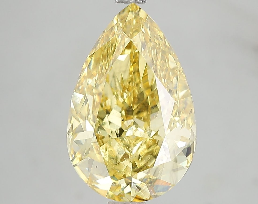 Loose Diamond - PEAR 5.0ct Fancy Vivid Yellow SI1: Loose Diamond - PEAR 5.0ct Fancy Vivid Yellow SI1 Source: This is a real non-mined Diamond that has been grown in a lab Shape: PEAR Carats: 5.0 Color: Fancy Vivid Yellow Certification: IGI Video: