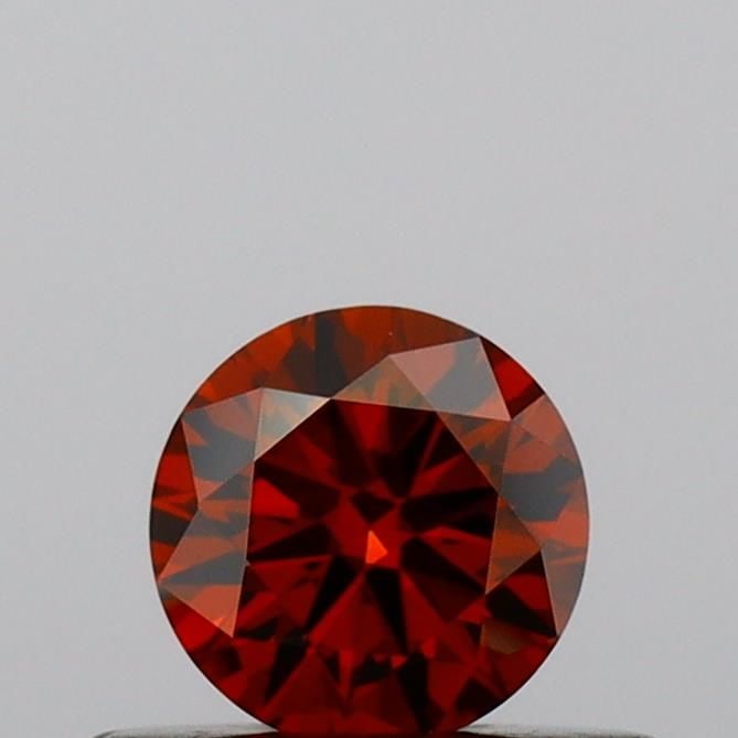 Loose Diamond - ROUND 0.3ct Fancy Deep Orange VVS2: Loose Diamond - ROUND 0.3ct Fancy Deep Orange VVS2 Source: This is a real non-mined Diamond that has been grown in a lab Shape: ROUND Carats: 0.3 Color: Fancy Deep Orange Certification: IGI Video: