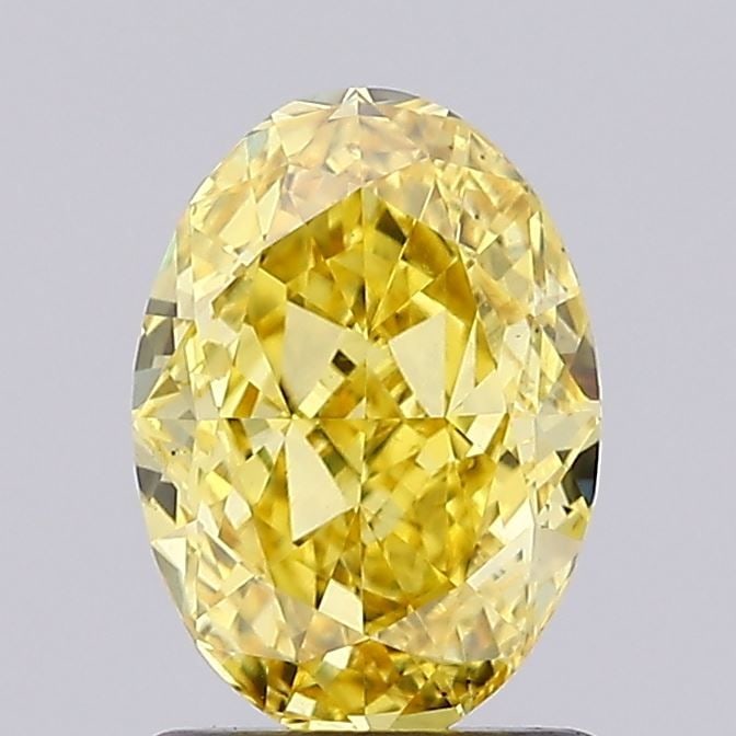 Loose Diamond - OVAL 1.4ct Fancy Vivid Yellow VS2: Loose Diamond - OVAL 1.4ct Fancy Vivid Yellow VS2 Source: This is a real non-mined Diamond that has been grown in a lab Shape: OVAL Carats: 1.4 Color: Fancy Vivid Yellow Certification: IGI Video:
