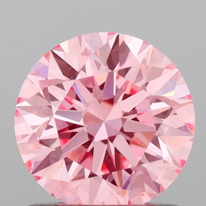 Ideal Loose Diamond - ROUND 0.96ct Fancy Vivid Pink VS1: Ideal Loose Diamond - ROUND 0.96ct Fancy Vivid Pink VS1 Source: This is a real non-mined Diamond that has been grown in a lab Shape: ROUND Carats: 0.96 Color: Fancy Vivid Pink Certification: IGI Video
