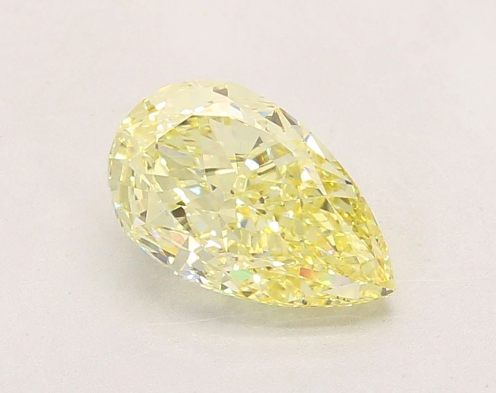 Loose Diamond - PEAR 2.34ct Fancy Yellow VVS2: Loose Diamond - PEAR 2.34ct Fancy Yellow VVS2 Source: This is a real non-mined Diamond that has been grown in a lab Shape: PEAR Carats: 2.34 Color: Fancy Yellow Certification: IGI Video: