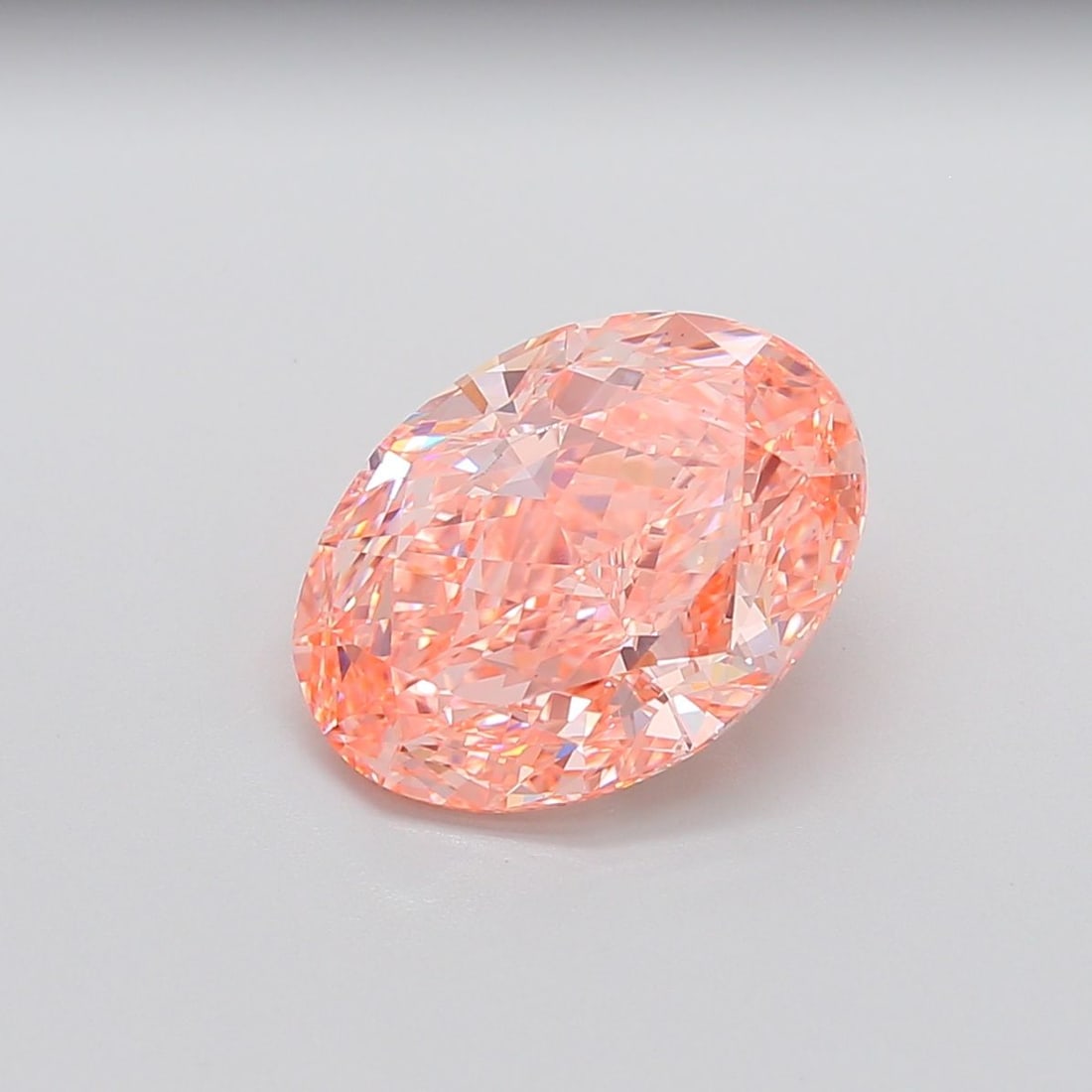 Loose Diamond - OVAL 6.41ct Fancy Vivid Pink VS1: Loose Diamond - OVAL 6.41ct Fancy Vivid Pink VS1 Source: This is a real non-mined Diamond that has been grown in a lab Shape: OVAL Carats: 6.41 Color: Fancy Vivid Pink Certification: IGI Video: