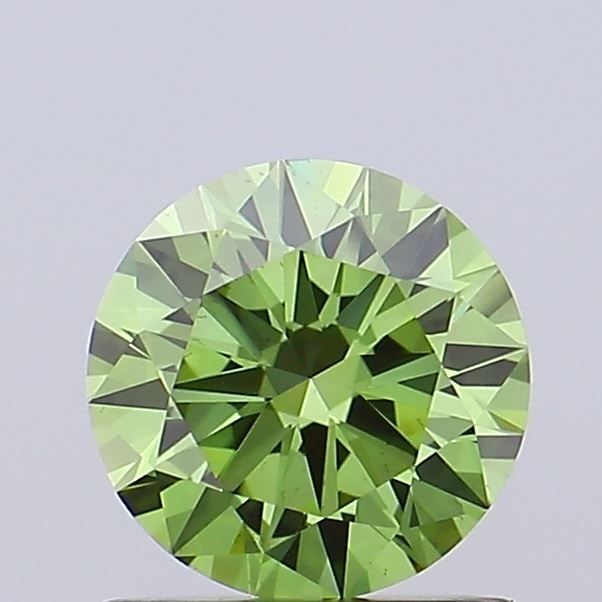 Loose Diamond - ROUND 0.94ct Fancy Vivid Green VS2: Loose Diamond - ROUND 0.94ct Fancy Vivid Green VS2 Source: This is a real non-mined Diamond that has been grown in a lab Shape: ROUND Carats: 0.94 Color: Fancy Vivid Green Certification: IGI Video: