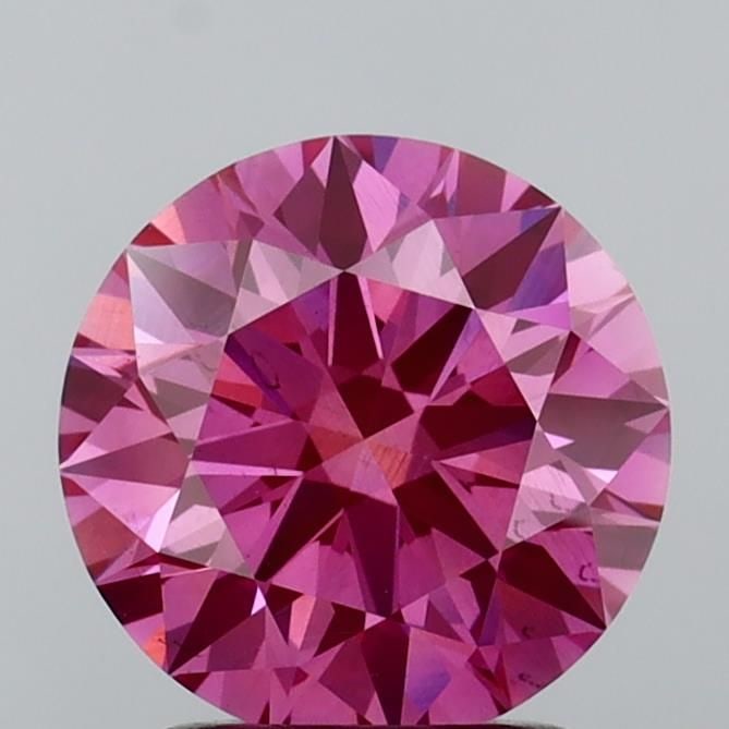 Ideal Loose Diamond - ROUND 2.01ct Fancy Vivid Pink SI1: Ideal Loose Diamond - ROUND 2.01ct Fancy Vivid Pink SI1 Source: This is a real non-mined Diamond that has been grown in a lab Shape: ROUND Carats: 2.01 Color: Fancy Vivid Pink Certification: IGI Video