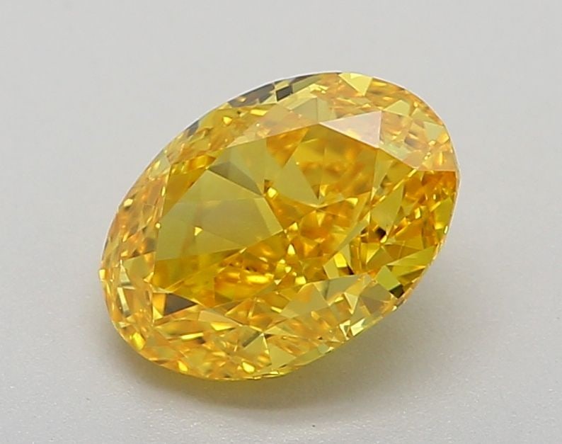 Loose Diamond - OVAL 1.03ct Fancy Vivid Yellow VVS2: Loose Diamond - OVAL 1.03ct Fancy Vivid Yellow VVS2 Source: This is a real non-mined Diamond that has been grown in a lab Shape: OVAL Carats: 1.03 Color: Fancy Vivid Yellow Certification: IGI Video: