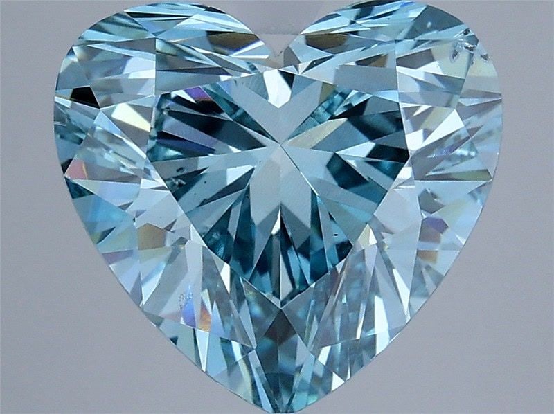Loose Diamond - HEART 4.01ct Fancy Vivid Blue SI1: Loose Diamond - HEART 4.01ct Fancy Vivid Blue SI1 Source: This is a real non-mined Diamond that has been grown in a lab Shape: HEART Carats: 4.01 Color: Fancy Vivid Blue Certification: IGI Video:
