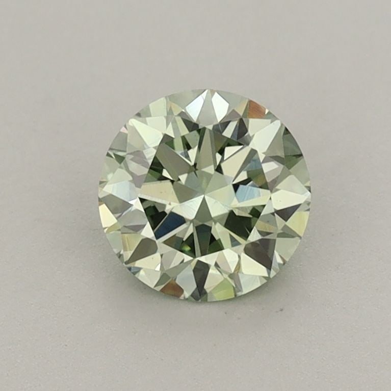 Loose Diamond - ROUND 0.74ct Fancy Vivid Green VS1: Loose Diamond - ROUND 0.74ct Fancy Vivid Green VS1 Source: This is a real non-mined Diamond that has been grown in a lab Shape: ROUND Carats: 0.74 Color: Fancy Vivid Green Certification: IGI Video: