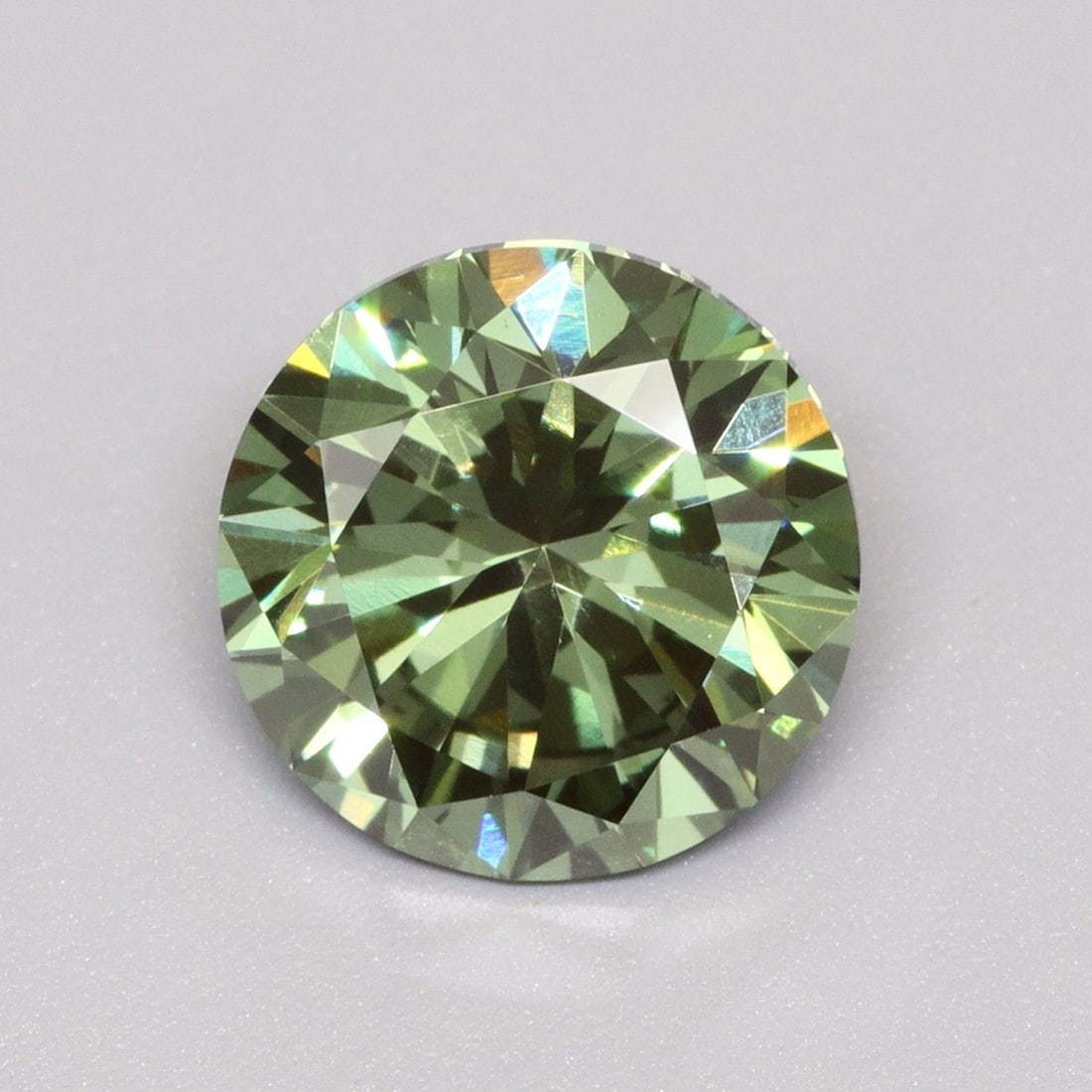 Loose Diamond - ROUND 1.53ct Fancy Vivid Green VS1: Loose Diamond - ROUND 1.53ct Fancy Vivid Green VS1 Source: This is a real non-mined Diamond that has been grown in a lab Shape: ROUND Carats: 1.53 Color: Fancy Vivid Green Certification: IGI Video: