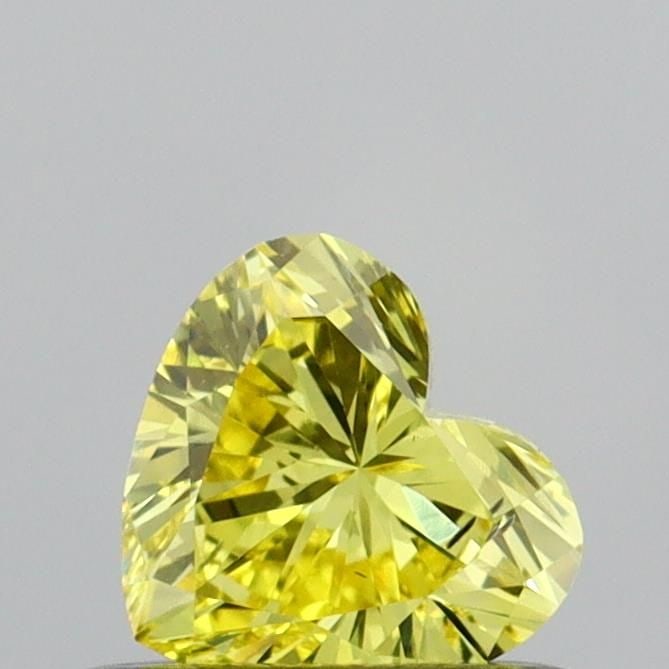 Loose Diamond - HEART 0.38ct Fancy Vivid Yellow VS2: Loose Diamond - HEART 0.38ct Fancy Vivid Yellow VS2 Source: This is a real non-mined Diamond that has been grown in a lab Shape: HEART Carats: 0.38 Color: Fancy Vivid Yellow Certification: IGI Video: