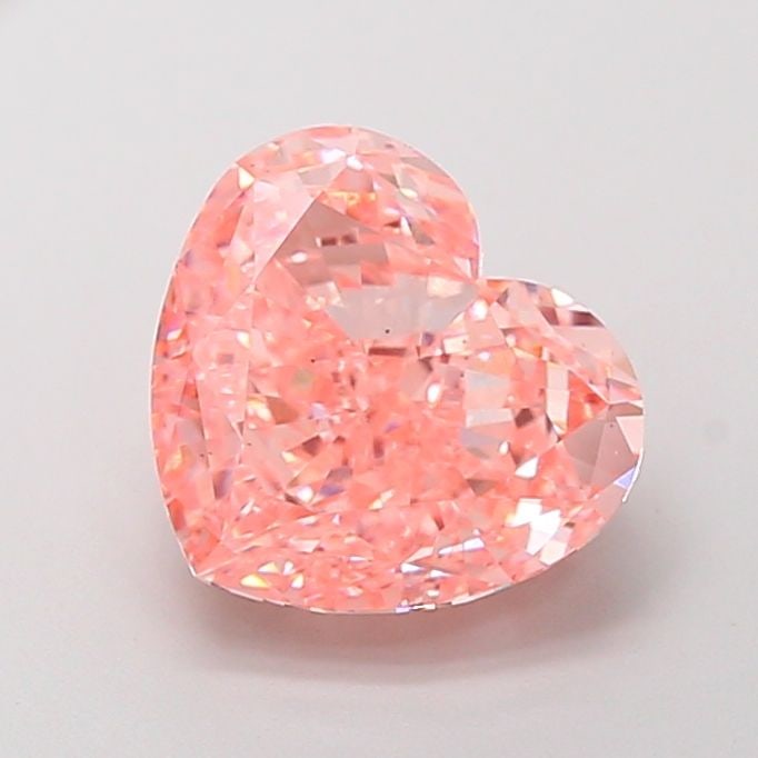 Loose Diamond - HEART 5.01ct Fancy Vivid Pink VS2: Loose Diamond - HEART 5.01ct Fancy Vivid Pink VS2 Source: This is a real non-mined Diamond that has been grown in a lab Shape: HEART Carats: 5.01 Color: Fancy Vivid Pink Certification: IGI Video: