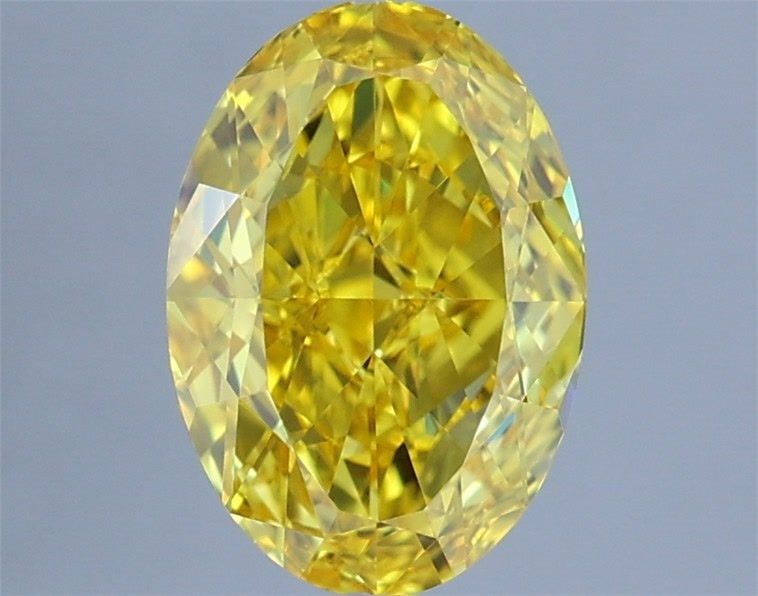 Loose Diamond - OVAL 1.4ct Fancy Vivid Yellow VVS2: Loose Diamond - OVAL 1.4ct Fancy Vivid Yellow VVS2 Source: This is a real non-mined Diamond that has been grown in a lab Shape: OVAL Carats: 1.4 Color: Fancy Vivid Yellow Certification: IGI Video: