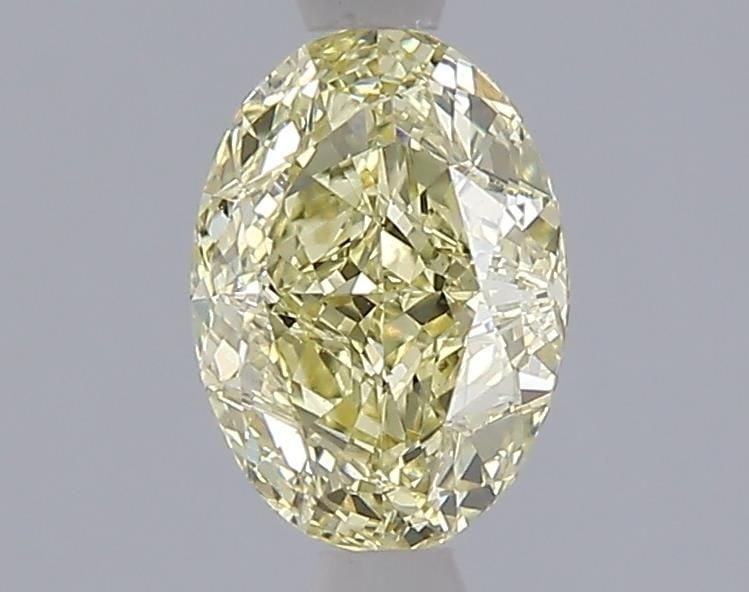 Loose Diamond - OVAL 1.07ct Fancy Yellow VS2: Loose Diamond - OVAL 1.07ct Fancy Yellow VS2 Source: This is a real non-mined Diamond that has been grown in a lab Shape: OVAL Carats: 1.07 Color: Fancy Yellow Certification: IGI Video: