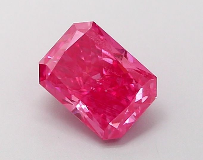 Loose Diamond - RADIANT 1.07ct Fancy Vivid Pink VS2: Loose Diamond - RADIANT 1.07ct Fancy Vivid Pink VS2 Source: This is a real non-mined Diamond that has been grown in a lab Shape: RADIANT Carats: 1.07 Color: Fancy Vivid Pink Certification: IGI Video: