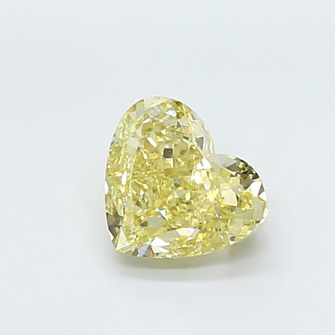 Loose Diamond - HEART 3.57ct Fancy Yellow VVS2: Loose Diamond - HEART 3.57ct Fancy Yellow VVS2 Source: This is a real non-mined Diamond that has been grown in a lab Shape: HEART Carats: 3.57 Color: Fancy Yellow Certification: IGI Video: