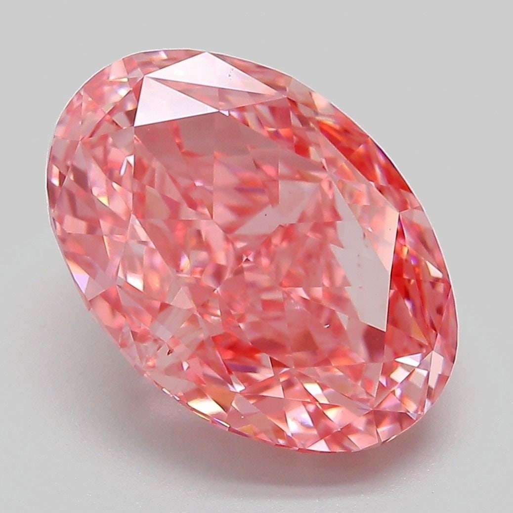 Loose Diamond - OVAL 6.55ct Fancy Vivid Pink VS1: Loose Diamond - OVAL 6.55ct Fancy Vivid Pink VS1 Source: This is a real non-mined Diamond that has been grown in a lab Shape: OVAL Carats: 6.55 Color: Fancy Vivid Pink Certification: IGI Video: