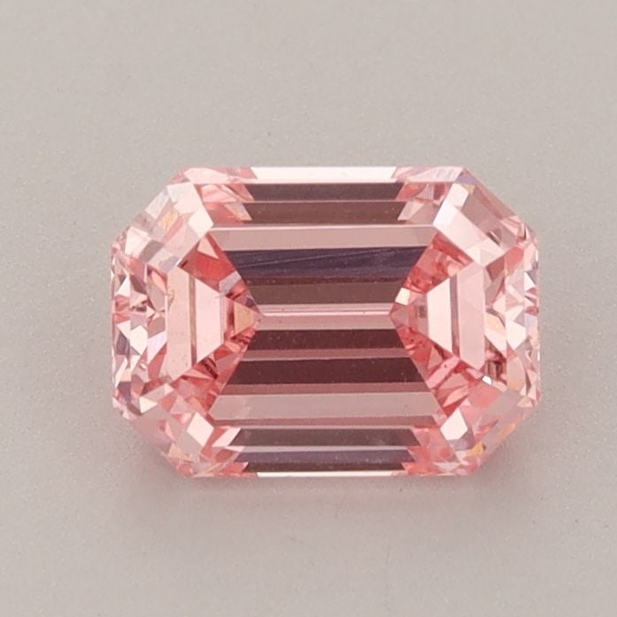Loose Diamond - EMERALD 0.99ct Fancy Vivid Pink VS2: Loose Diamond - EMERALD 0.99ct Fancy Vivid Pink VS2 Source: This is a real non-mined Diamond that has been grown in a lab Shape: EMERALD Carats: 0.99 Color: Fancy Vivid Pink Certification: IGI Video: