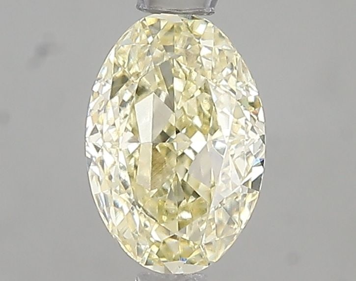 Loose Diamond - OVAL 1.06ct Fancy Light Yellow VVS2: Loose Diamond - OVAL 1.06ct Fancy Light Yellow VVS2 Source: This is a real non-mined Diamond that has been grown in a lab Shape: OVAL Carats: 1.06 Color: Fancy Light Yellow Certification: IGI Video: