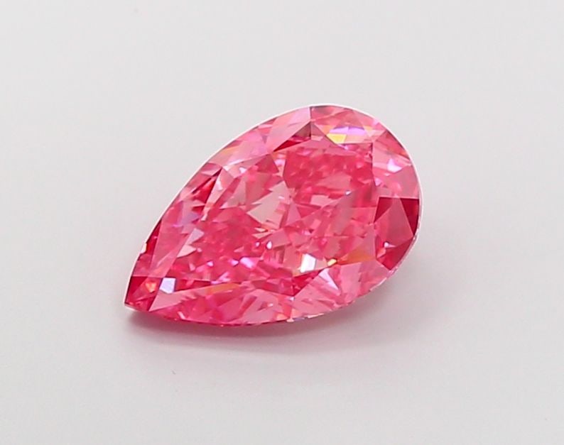 Loose Diamond - PEAR 3.52ct Fancy Vivid Pink VVS2: Loose Diamond - PEAR 3.52ct Fancy Vivid Pink VVS2 Source: This is a real non-mined Diamond that has been grown in a lab Shape: PEAR Carats: 3.52 Color: Fancy Vivid Pink Certification: IGI Video: