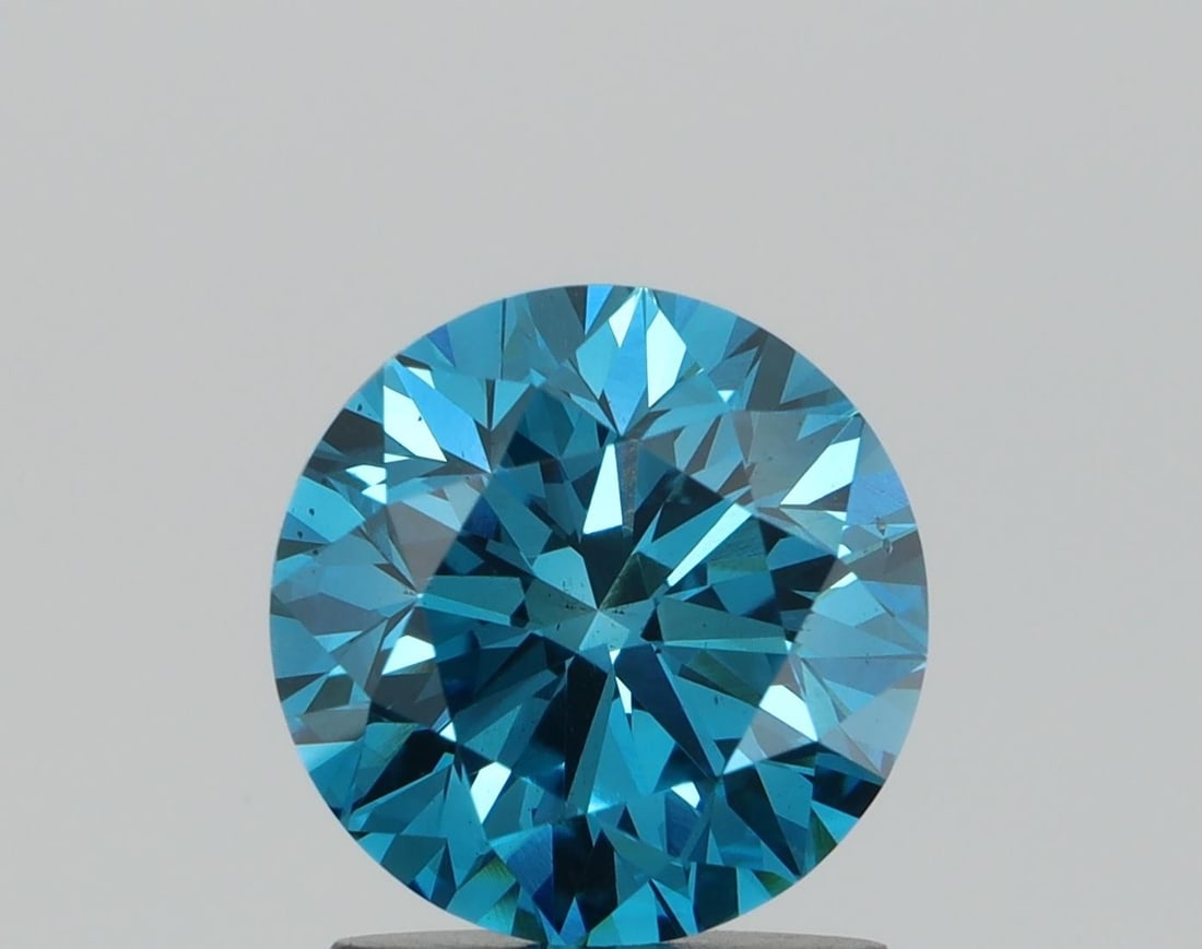 Loose Diamond - ROUND 1.42ct Fancy Blue VS2: Loose Diamond - ROUND 1.42ct Fancy Blue VS2 Source: This is a real non-mined Diamond that has been grown in a lab Shape: ROUND Carats: 1.42 Color: Fancy Blue Certification: NONE Video: