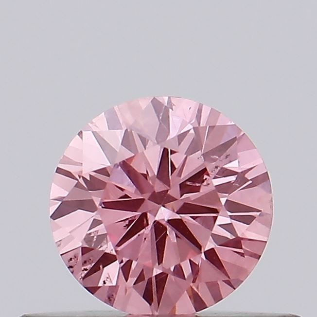 Loose Diamond - ROUND 0.35ct Fancy Vivid Pink SI1: Loose Diamond - ROUND 0.35ct Fancy Vivid Pink SI1 Source: This is a real non-mined Diamond that has been grown in a lab Shape: ROUND Carats: 0.35 Color: Fancy Vivid Pink Certification: IGI Video: