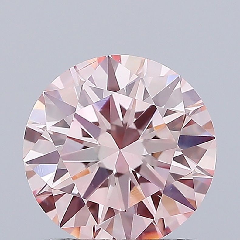 Loose Diamond - ROUND 1.35ct Fancy Intense Pink VS1: Loose Diamond - ROUND 1.35ct Fancy Intense Pink VS1 Source: This is a real non-mined Diamond that has been grown in a lab Shape: ROUND Carats: 1.35 Color: Fancy Intense Pink Certification: IGI Video: