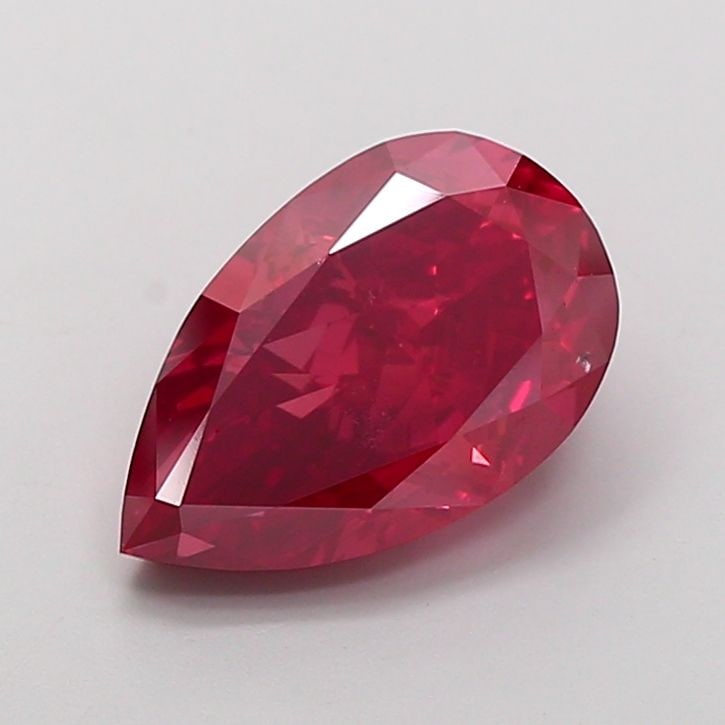 Loose Diamond - PEAR 5.7ct Fancy Red VS2: Loose Diamond - PEAR 5.7ct Fancy Red VS2 Source: This is a real non-mined Diamond that has been grown in a lab Shape: PEAR Carats: 5.7 Color: Fancy Red Certification: NONE The Diamond Depot Guarantee:
