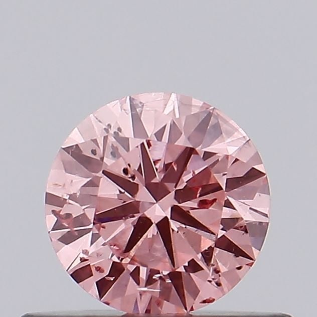 Loose Diamond - ROUND 0.42ct Fancy Vivid Pink SI2: Loose Diamond - ROUND 0.42ct Fancy Vivid Pink SI2 Source: This is a real non-mined Diamond that has been grown in a lab Shape: ROUND Carats: 0.42 Color: Fancy Vivid Pink Certification: IGI Video:
