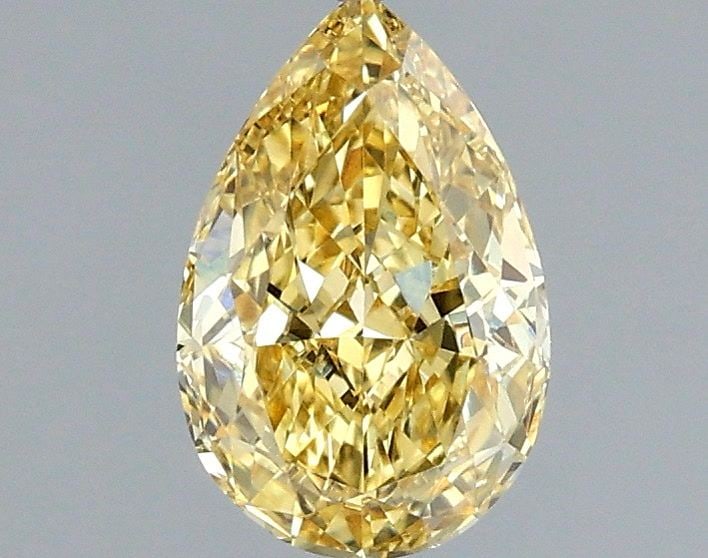 Loose Diamond - PEAR 1.08ct Fancy Vivid Yellow VS1: Loose Diamond - PEAR 1.08ct Fancy Vivid Yellow VS1 Source: This is a real non-mined Diamond that has been grown in a lab Shape: PEAR Carats: 1.08 Color: Fancy Vivid Yellow Certification: IGI Video: