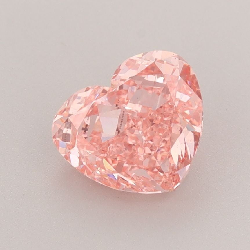 Loose Diamond - HEART 1.69ct Fancy Vivid Pink VS1: Loose Diamond - HEART 1.69ct Fancy Vivid Pink VS1 Source: This is a real non-mined Diamond that has been grown in a lab Shape: HEART Carats: 1.69 Color: Fancy Vivid Pink Certification: IGI Video: