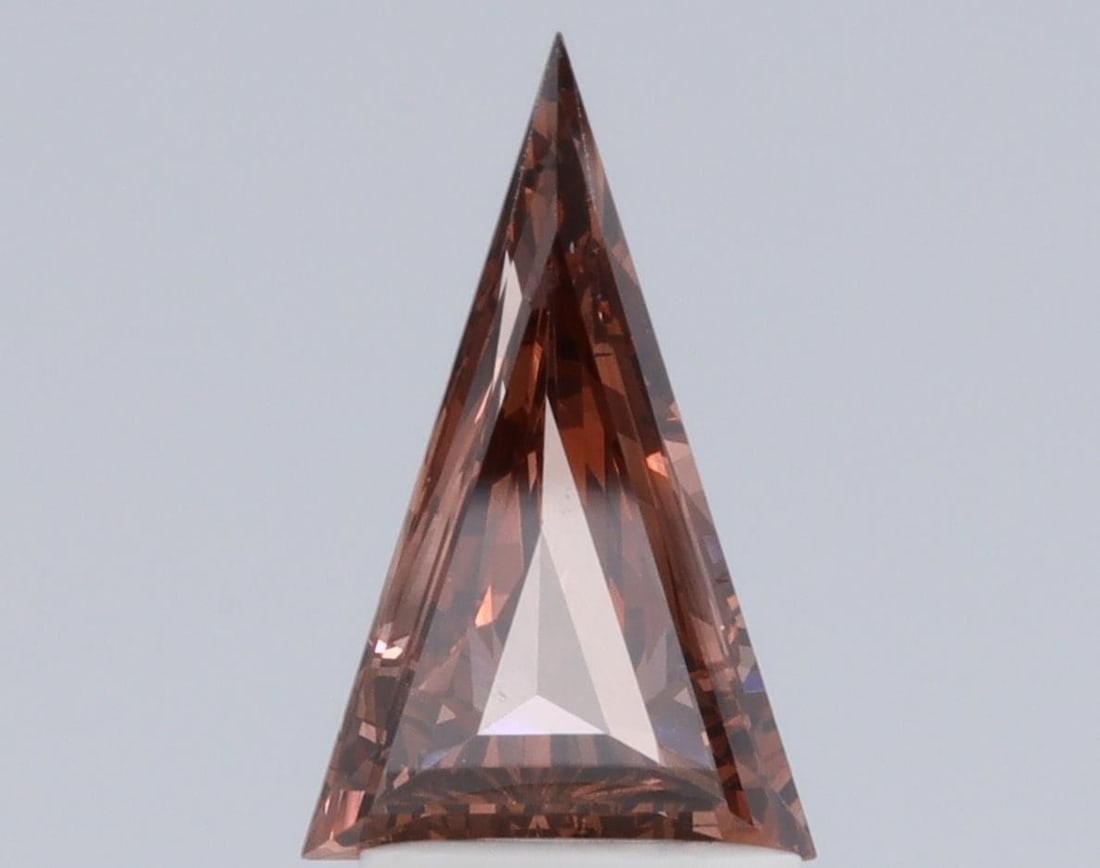 Loose Diamond - KITE 1.09ct Brown VS1: Loose Diamond - KITE 1.09ct Brown VS1 Source: This is a real non-mined Diamond that has been grown in a lab Shape: KITE Carats: 1.09 Color: Brown Certification: NONE Video: