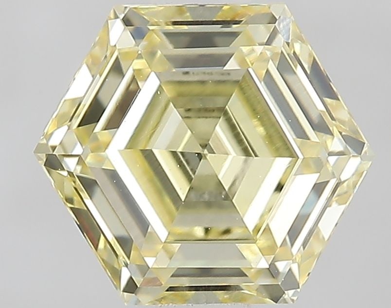 Loose Diamond - HEXAGONAL 1.5ct Fancy Yellow VVS2: Loose Diamond - HEXAGONAL 1.5ct Fancy Yellow VVS2 Source: This is a real non-mined Diamond that has been grown in a lab Shape: HEXAGONAL Carats: 1.5 Color: Fancy Yellow Certification: IGI Video: