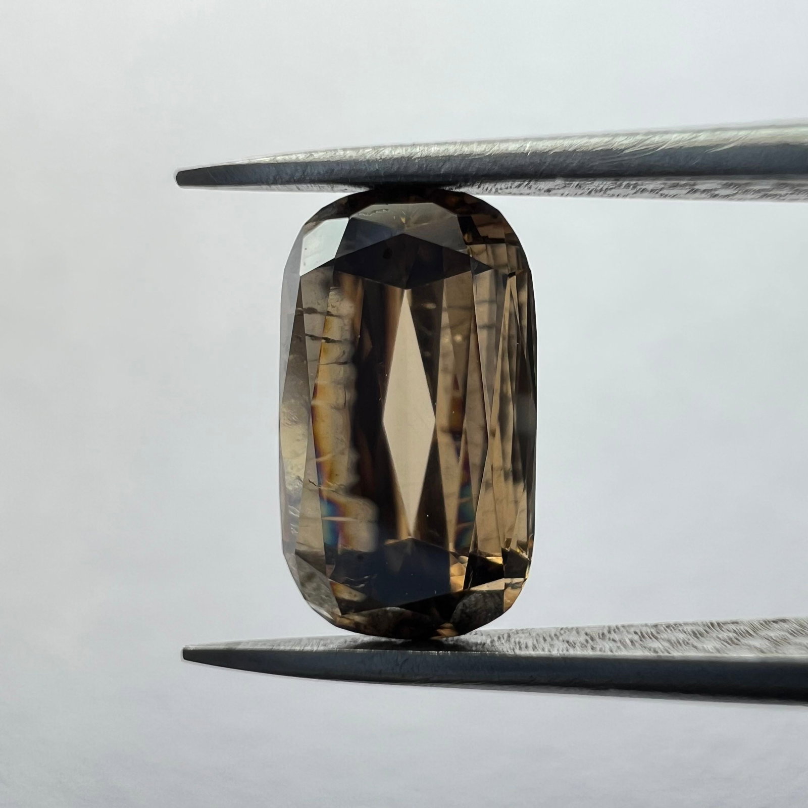 Loose Diamond - CUSHION BRILLIANT 0.78ct Brown SI1: Loose Diamond - CUSHION BRILLIANT 0.78ct Brown SI1 Source: This is a real non-mined Diamond that has been grown in a lab Shape: CUSHION BRILLIANT Carats: 0.78 Color: Brown Certification: NONE The Diam