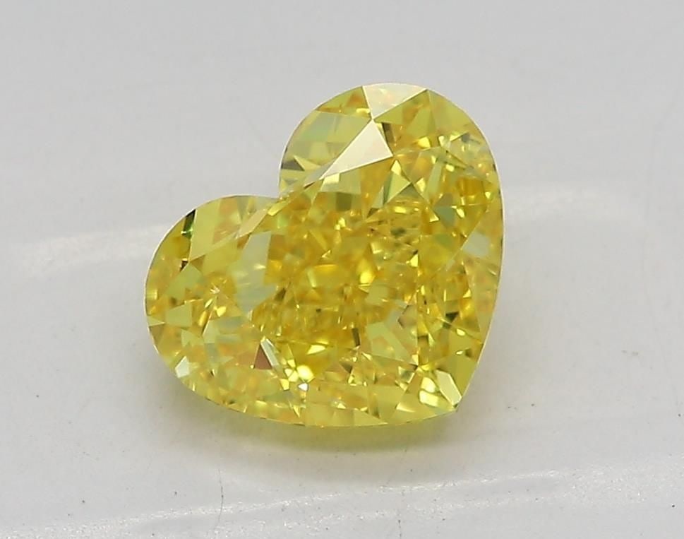 Loose Diamond - HEART 1.6ct Fancy Vivid Yellow VVS2: Loose Diamond - HEART 1.6ct Fancy Vivid Yellow VVS2 Source: This is a real non-mined Diamond that has been grown in a lab Shape: HEART Carats: 1.6 Color: Fancy Vivid Yellow Certification: IGI Video:
