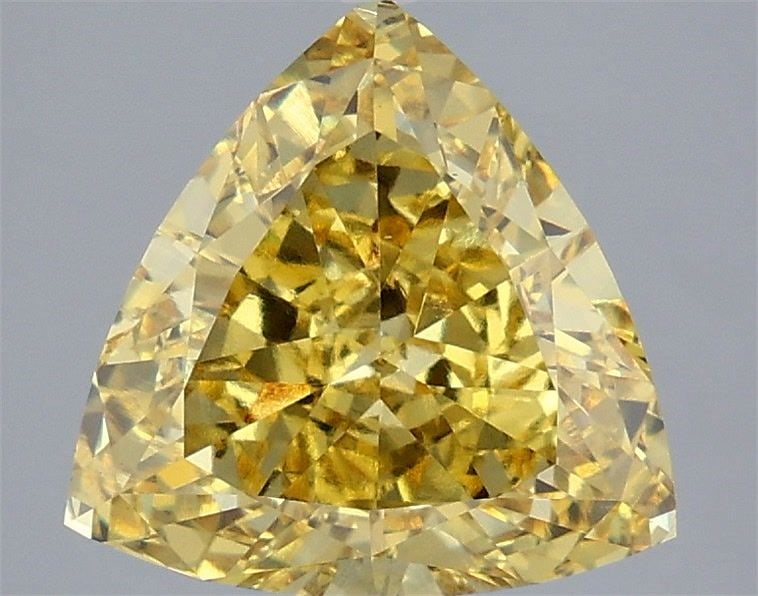 Loose Diamond - TRIANGULAR 4.07ct Fancy Vivid Yellow VS1: Loose Diamond - TRIANGULAR 4.07ct Fancy Vivid Yellow VS1 Source: This is a real non-mined Diamond that has been grown in a lab Shape: TRIANGULAR Carats: 4.07 Color: Fancy Vivid Yellow Certification: I